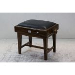 Early 20th century Mahogany Piano Stool with black vinyl upholstered seat and adjustable rise and