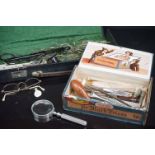 A collection of vintage spectacle frames together with a quantity of medical equipment including