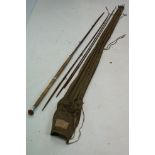 Farlows - a spliced three-piece greenheart rod, 10'.9", plus spare tip, in canvas bag with '