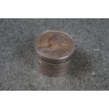 A antique sterling silver pill box made from Victorian Indian one rupee coins.