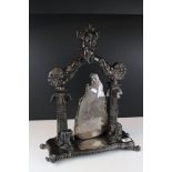 A ebony and white metal Ceylon presentation piece in the form of a temple entrance with white