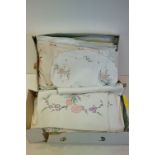 A collection of vintage Linen contained within two boxes to include table clothes etc