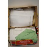 A large collection of vintage Linen contained within two boxes to include table cloths etc