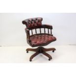 Victorian style Swivel Office Tub Chair upholstered in button red leather
