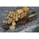 A small box of collectables to include button hooks, sewing scissors, ivory thimbles and beads.