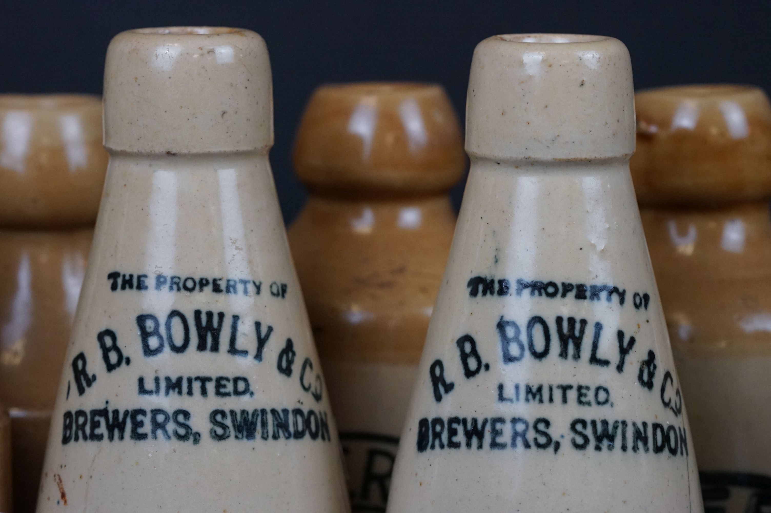 Collection of Fourteen Antique Stoneware Bottles, mostly Swindon Ginger Beer Bottles - Image 4 of 8
