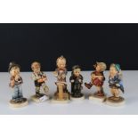 Six Goebel Hummel Figures including Chimney Sweep, Home from market, Band Leader, Serenade,