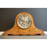 A vintage German wooden cased chiming mantle clock.
