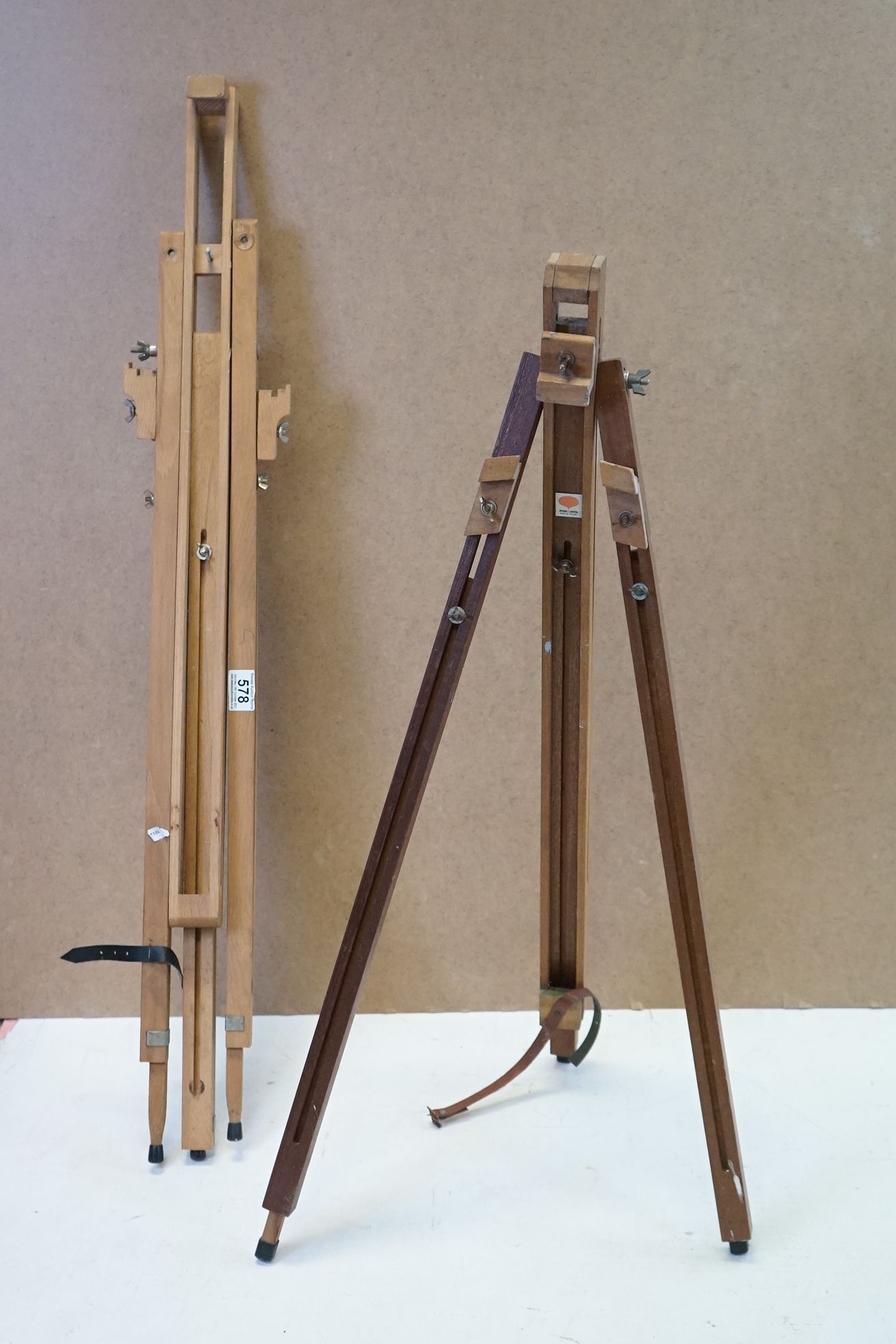 Winsor And Newton artist's easel, together with another (2)