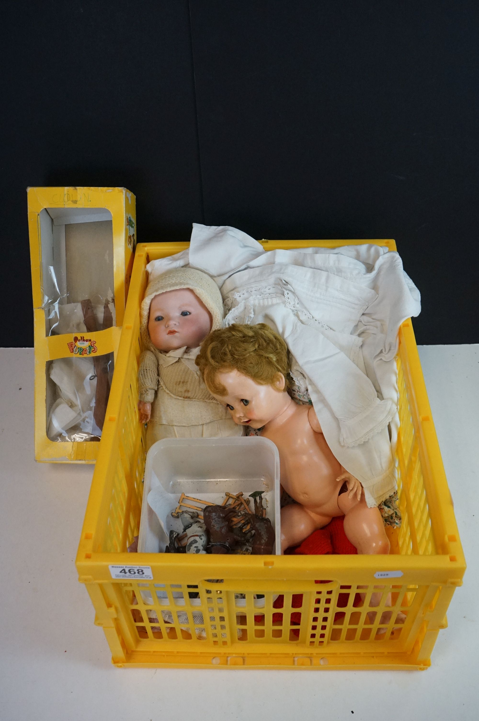 A small collection of vintage toys and linens to include dolls, lead farm animals and a Pelham