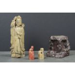 Soapstone figure of an Elder on soapstone stand (detached) together with two hardstone seals (3)