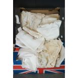 A collection of vintage Linen contained within two boxes to include table cloths etc..