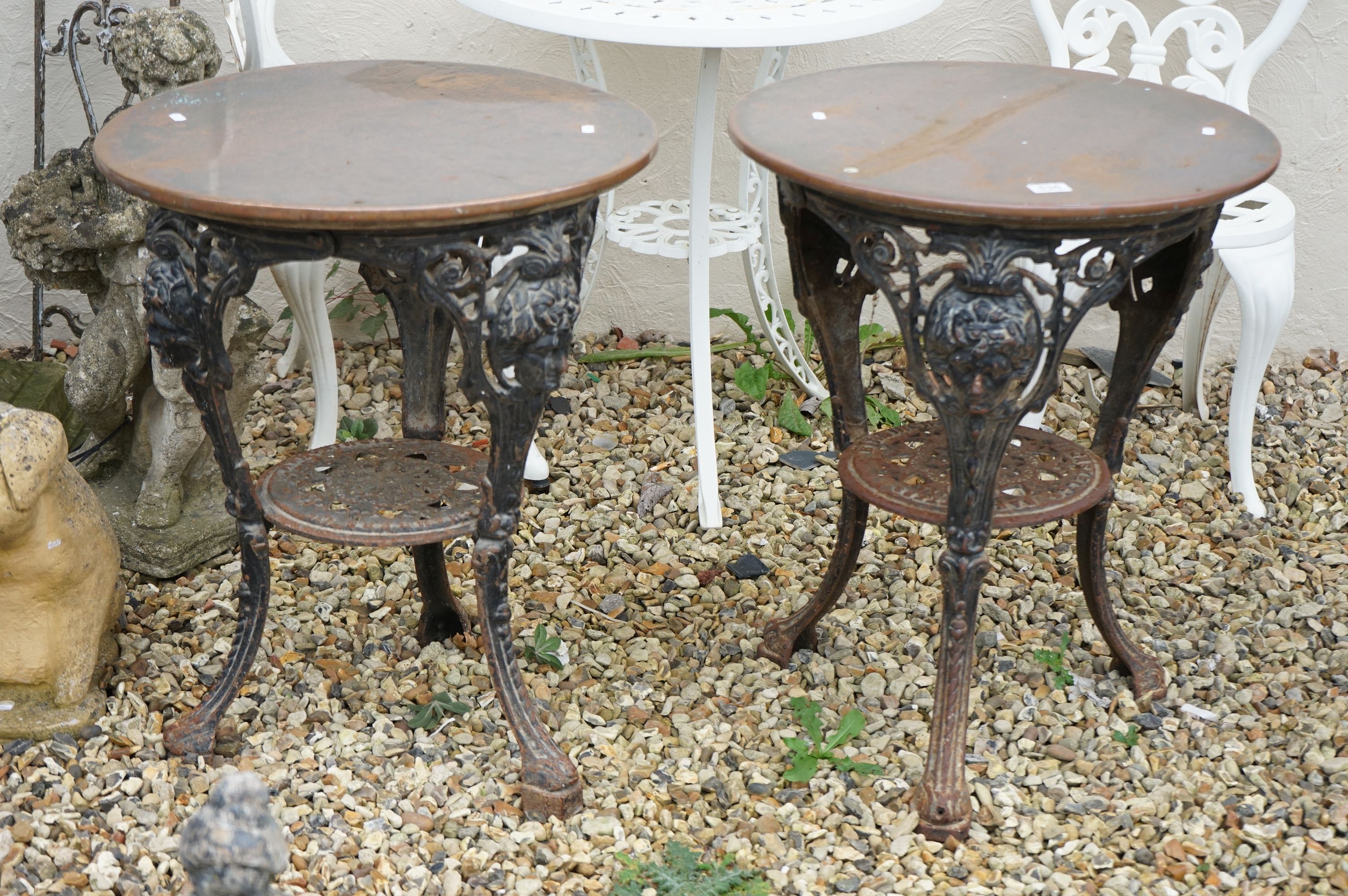 Pair of Cast Iron Circular Pub Tables with Copper Tops, with makers marks