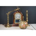 A collection of three vintage table lamps to include brass examples together with a mantle clock.