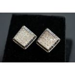 Pair of 14ct white gold pavé set sapphire and diamond earrings