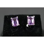 Pair of silver and amethyst stud earrings