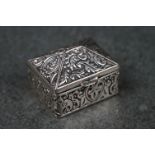 A vintage fully hallmarked sterling silver sarcophagus shaped pill box.