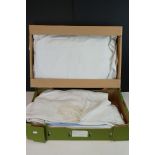 A collection of vintage Linen contained within two boxes to include table clothes etc