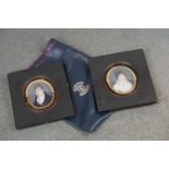 A pair of 19th century framed and glazed miniature portraits of a lady and gentleman.