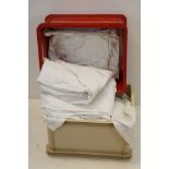 A large collection of vintage Linen contained within two boxes to include table cloths etc