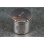 A fully hallmarked sterling silver pill box with screw thread lid, assay marked for London.