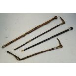 Three Victorian walking canes & a riding crop