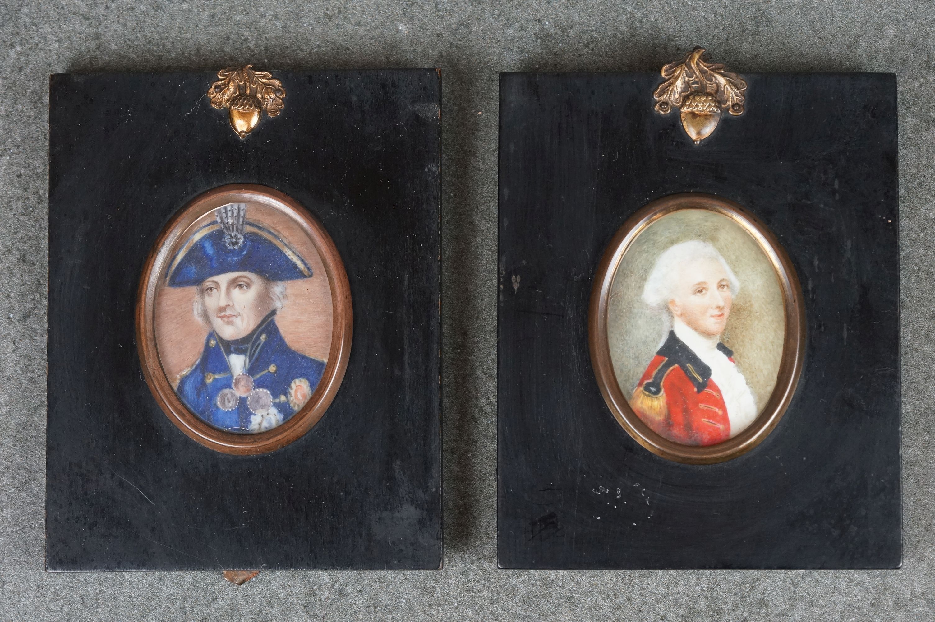 Two framed miniature portraits of gentlemen in military uniforms.