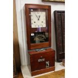 A vintage National Time Recorder Co. punch card machine, dial marked St. Mary Cray, Kent.