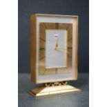 Mid 20th century Swiss Uti 8 day Alarm Gilt Cased Mantle Clock, 16cms high