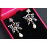 Pair of silver and enamel set earrings