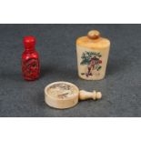 A collection of three oriental snuff boxes to include bone and Cinnabar examples.