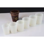Set of Six graduating stacking Tumbler Set with lid contained in a brown leather case