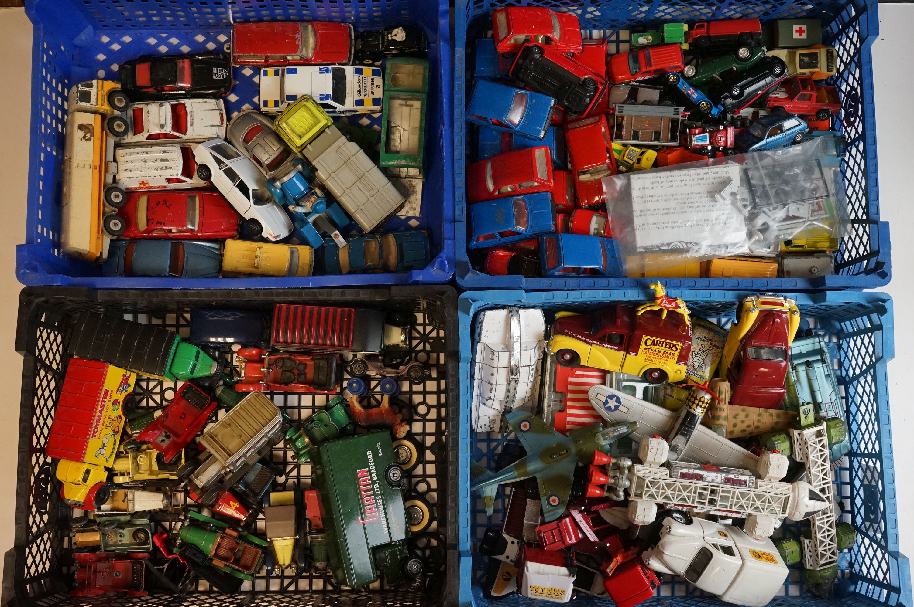 A large collection of vintage play worn die cast vehicles to include Corgi and Dinky examples.