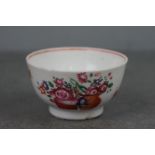 A 19th century Newhall soft paste porcelain tea bowl.