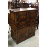 Good Quality Oak Side Cupboard in the 18th century manner comprising two panel doors above a brush