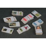 A small collection of cigarette and tea cards to include Gallaher and John Player examples.