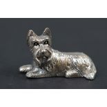 Silver figure of a terrier dog