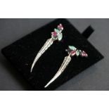Pair of silver earrings, set with rubies and other stones