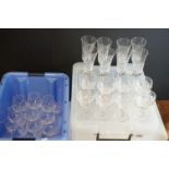 A large quantity of crystal cut glasses to include wine glasses, brandy glasses and tumblers.