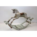 Antique Painted Wooden Carved Rocking Horse on a bow rocker, possibly G & J Lines or Ayres, 131cms