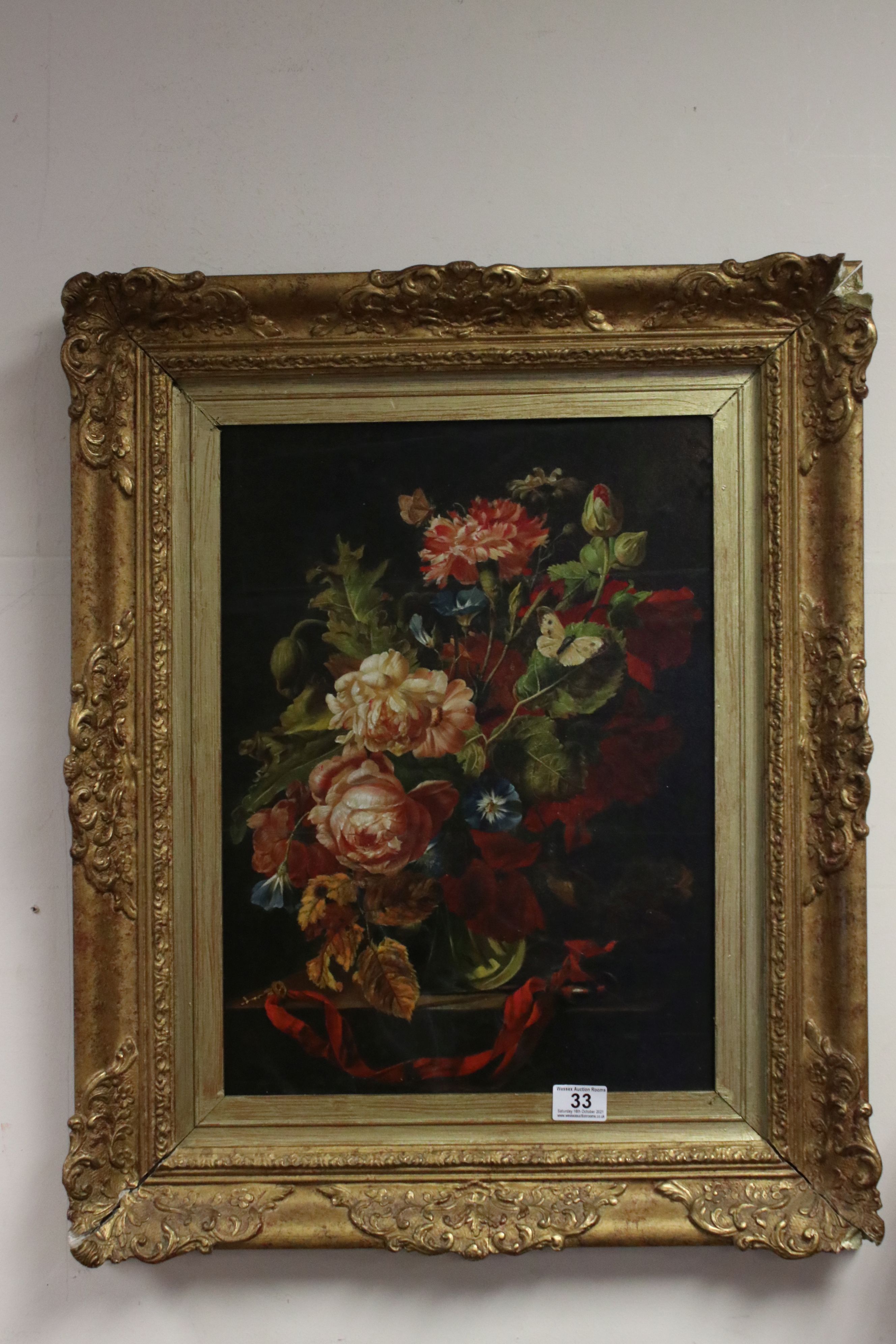 Ornate gilt framed oil painting, still life classical study of a floral display with butterfly