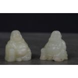 Two small carved jade Buddhas