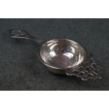 A fully hallmarked sterling silver tea strainer, assay marked for Birmingham and maker marked for