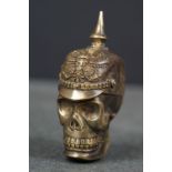 Brass cased skull shaped vesta