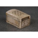 An antique carved bone trinket box, marked Capt. J.B. Selby to the base.