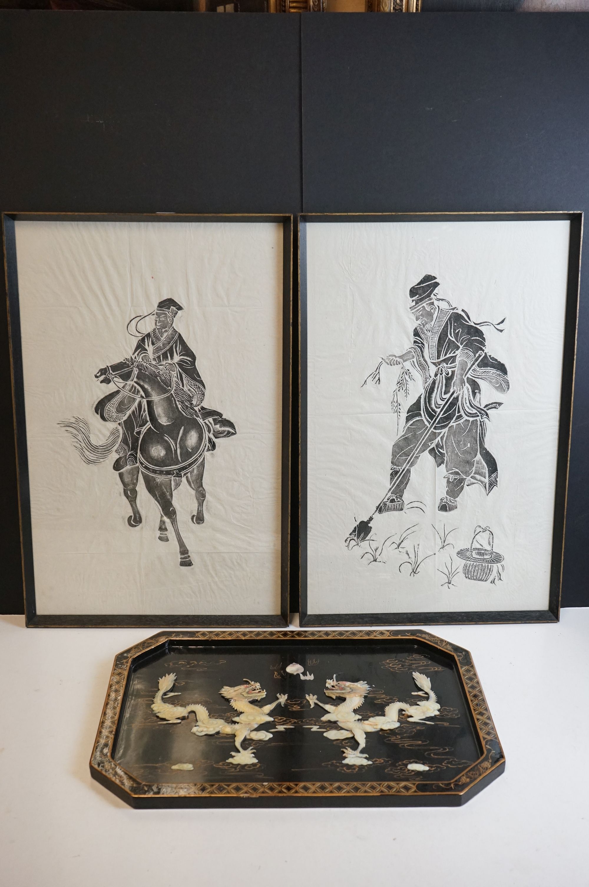 A Chinese lacquer ware tray with mother of pearl dragon decoration together with two framed and