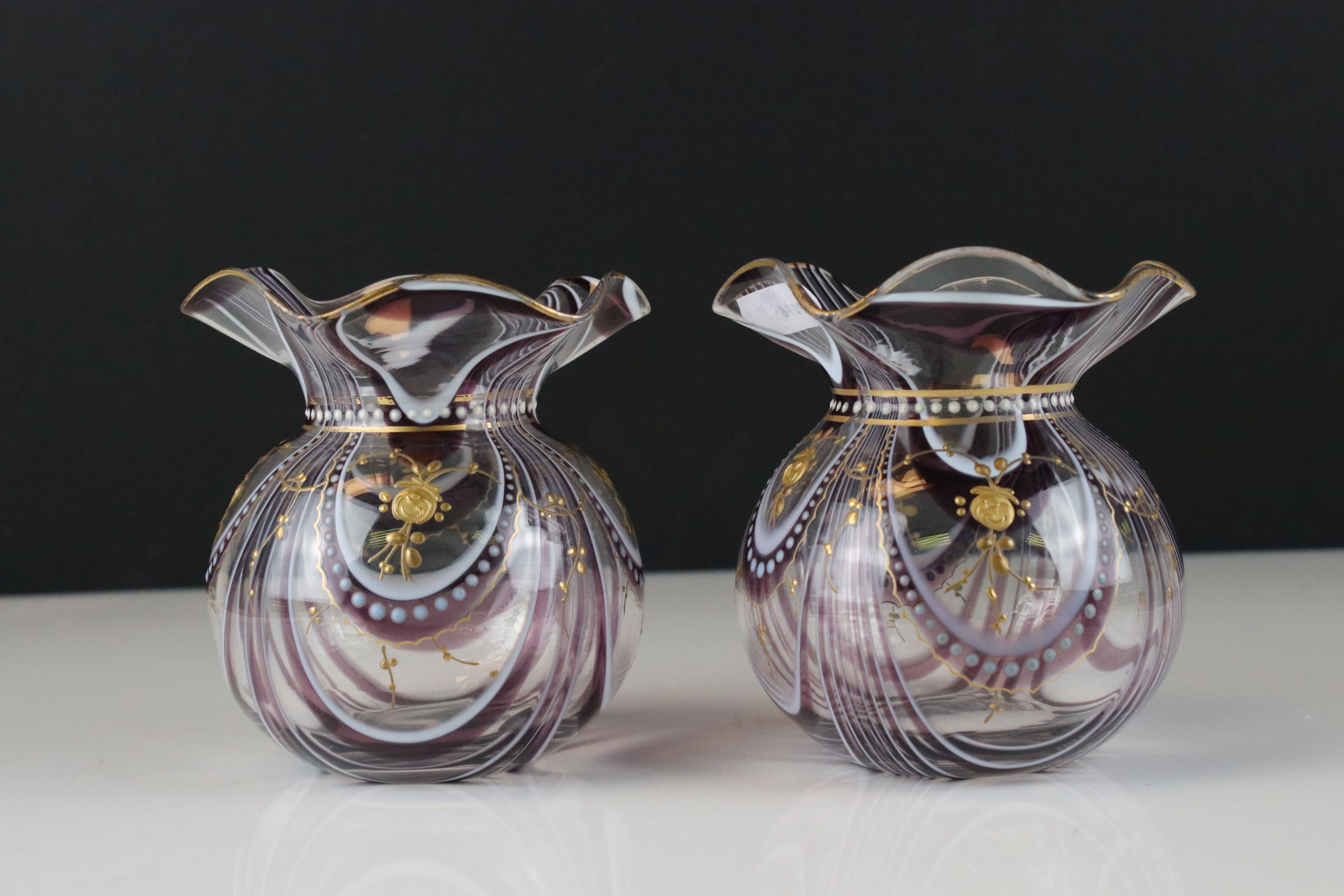 Pair of Purple and White Swirl Glass Bowls with delicate gilt enamelling and wave neck rims,