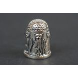 Silver thimble with cat decoration