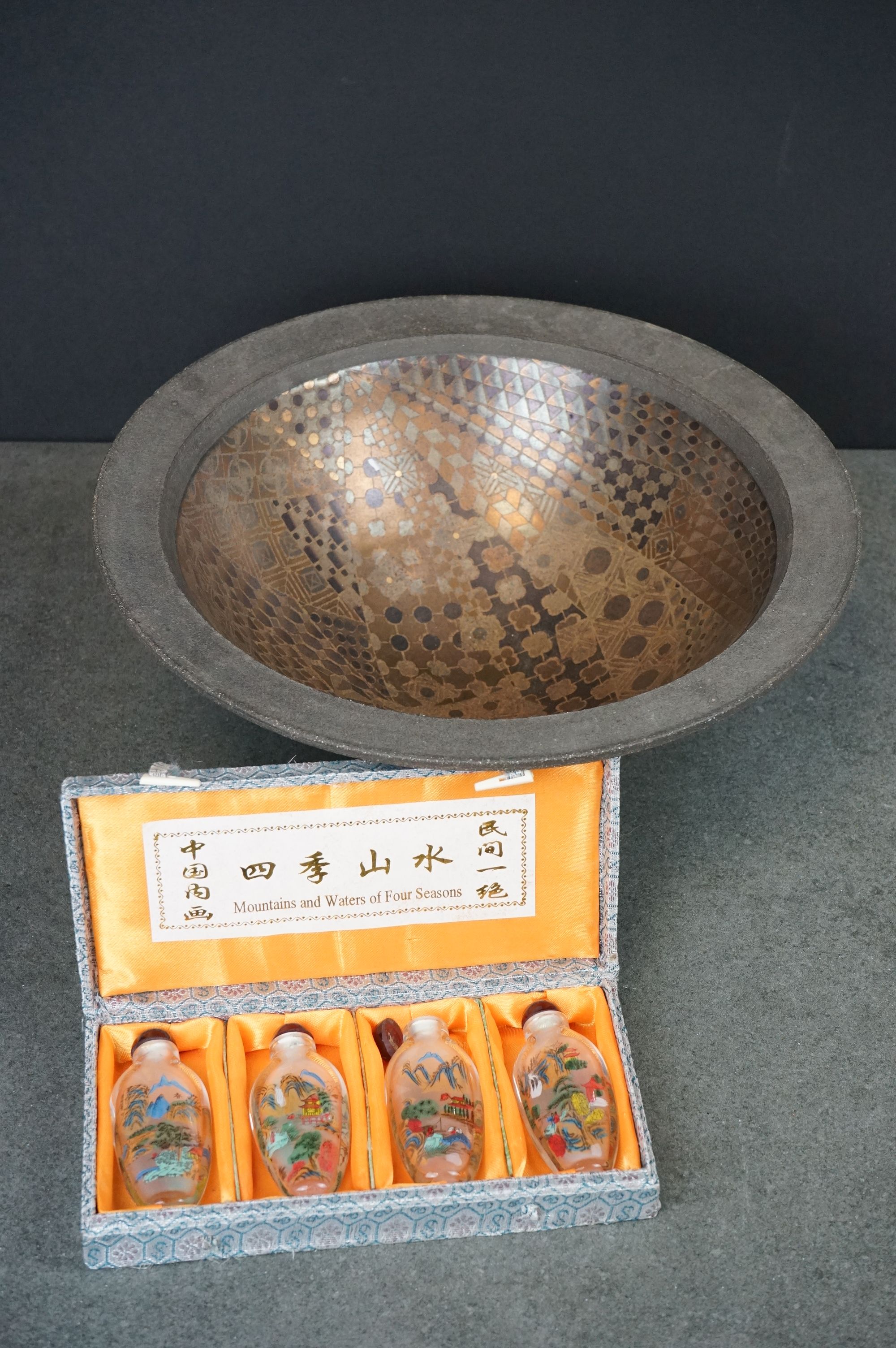 A studio pottery bowl together with four boxed glass oriental snuff bottles.