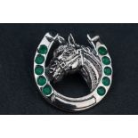 Silver horseshoe brooch-pendant